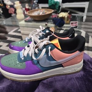 Nike Sneakers with Black and Gold Accents